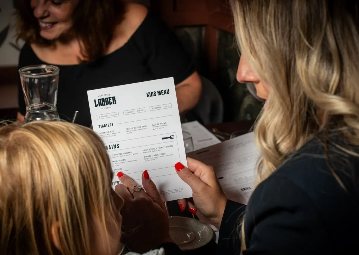 Larder kids menu in-between a kid and parent