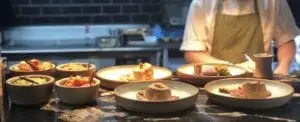 Dishing up plates in the kitchen