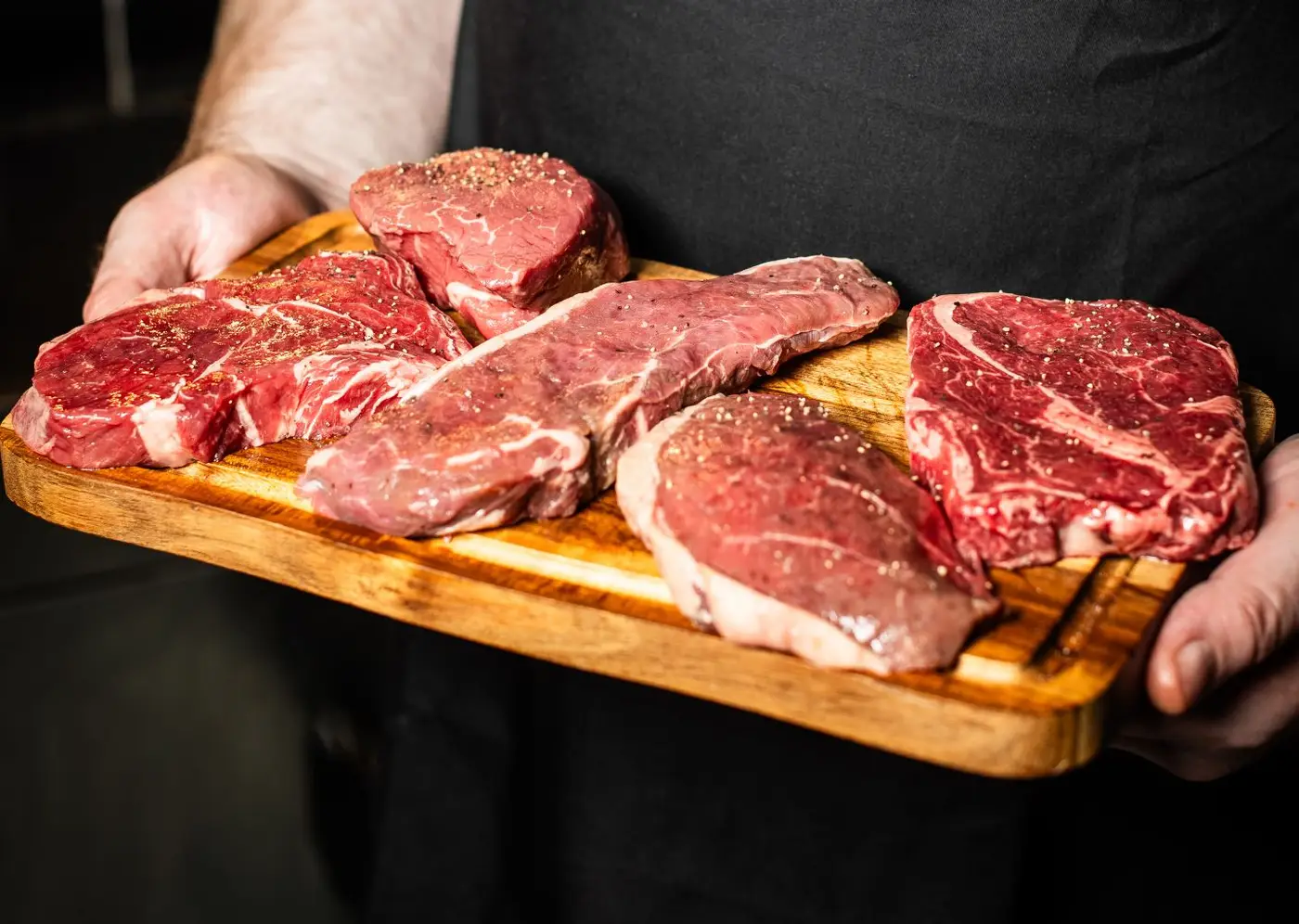 Fresh steak on a wooden board