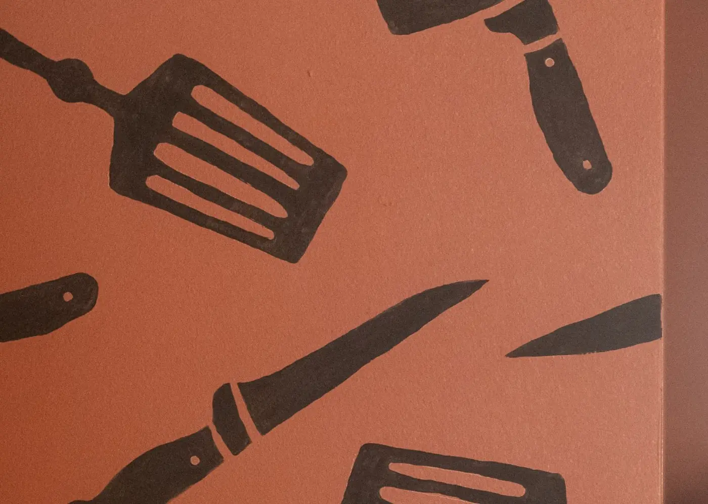 Larder's illustrations on the wall in the restaurant