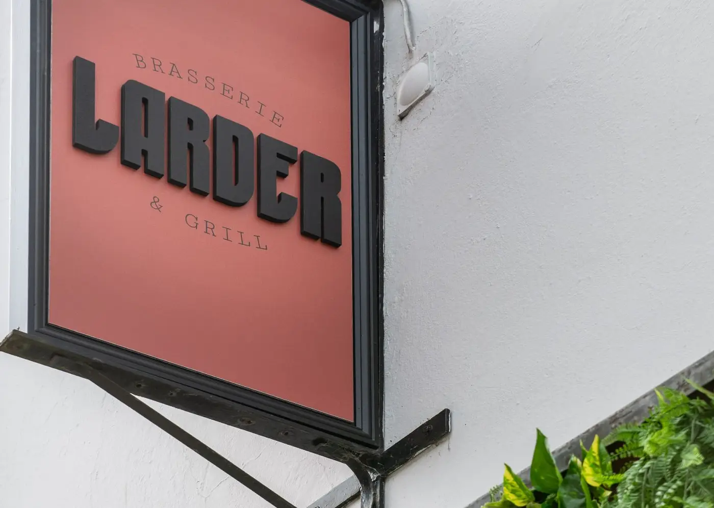 Larder exterior sign