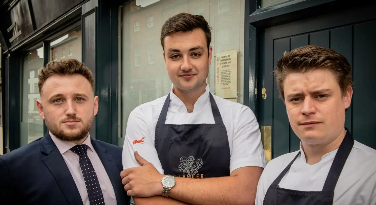 Larder journey - Luke, Alex and Alec outside of Larder in 2019